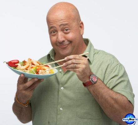 Photo of Andrew Zimmern at a concert