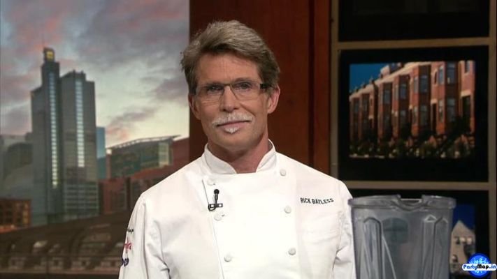 Photo of Rick Bayless at a concert