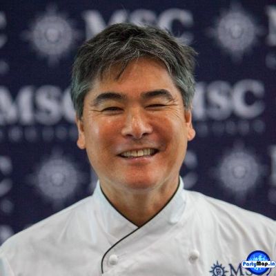 Photo of Roy Yamaguchi at a concert